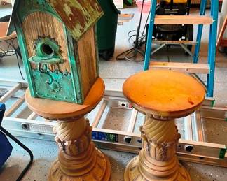 Matching pedestals, awesome bird house!
