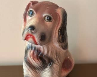 vintage 1940s chalkware dog figurine, often referred to as a carnival prize.