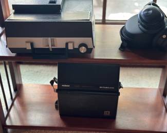 vintage Kodak Ektasound 140 Super 8mm movie camera kit, vintage Sears Easi-Load slide projector, likely model RF-53 or a similar 837-series unit.vintage Sears Easi-Load slide projector, likely model RF-53 or a similar 837-series unit.