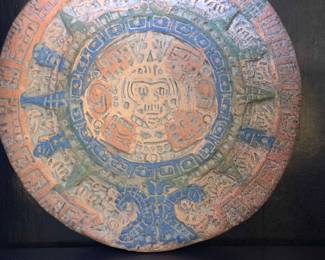 terracotta wall plaque is a Mexican folk art
