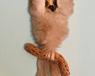 vintage 1970s style macrame owl wall hanging features fluffy cream-colored wool