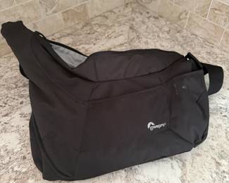 black Lowepro Passport Sling III camera bag