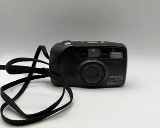 Pentax IQZoom EZY 35mm point-and-shoot camera featuring a 38-70mm autofocus zoom lens