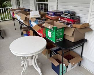 Books and outdoor furniture will be located on the wrap around porch
