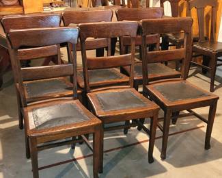 6 antique oak dining chairs w/original leather seats & finish