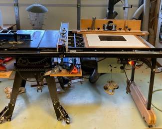  Craftsman Contractor Table Saw   220v Cast iron table with cast iron wings After market Upgrades:  Paddle stop power switch.  Incra V27 miter gauge Miter gauge fence with work stop Shop Fox Fence and 54” table extension no Built in Router Table with dust collection box and Dewalt Router installed.  Riving Knife.  Link belt.   Balanced v pulleys (available but not installed)  4” dust collection with blast gates for saw and router. Retractable Casters 