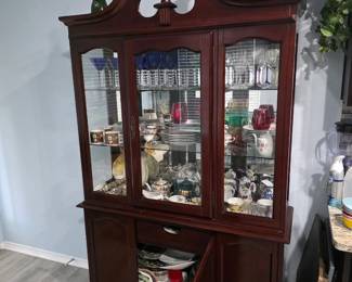 Beautiful hutch full of neat finds!