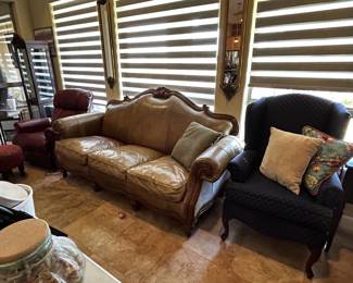 Elegant leather couch and arm chairs
