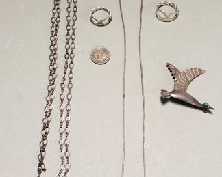 Lot # : 37 - Silver pieces, rings, necklaces, bird brooch with turquoise eye, and 10 cent coin from Philippines