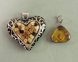Lot # : 46 - Sterling silver flowers in amber pendants
