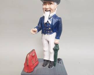 065 Lot 352 Vintage cast iron Uncle Sam mechanical coin bank