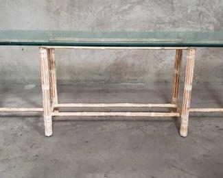 013 Lot 77 McGuire bamboo and rattan console table with