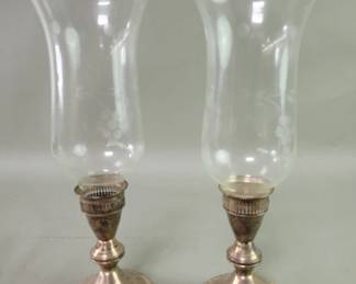 080 Lot 547 Sterling silver weighted candlesticks with