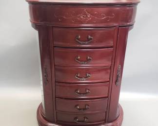 131 Lot 573 Mahogany jewelry cabinet with etched glass side