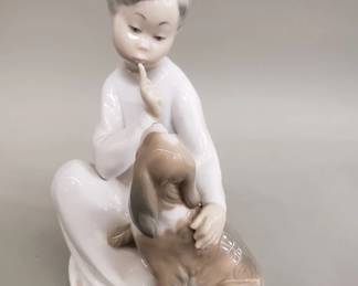 Lot # : 107 - Lladro "Boy with dog" porcelain figurine