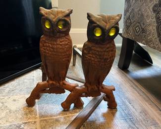 Antique cast iron owl andirons with glass eyes