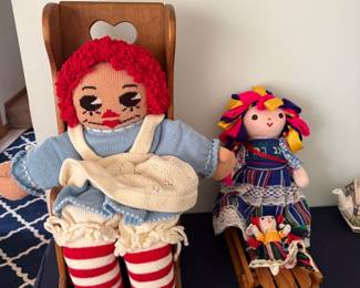 Ragdolls and chair and sled