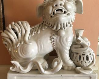 Pair of Chinese Foo dogs, This one has a repair on bottom left scroll