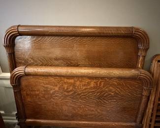 Antique tiger oak bed, one rail needs repair. It is absolutely gorgeous!