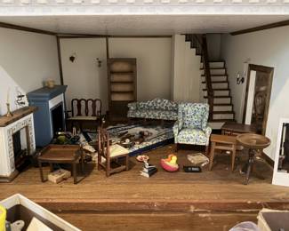 1960 doll house. Needs work, but has tons of miniatures. At one time all the lights lit up.