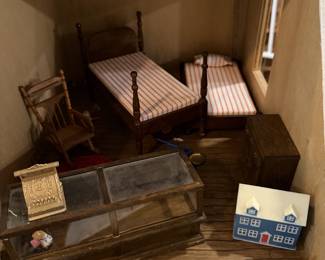 1960 doll house. Needs work, but has tons of miniatures. At one time all the lights lit up.