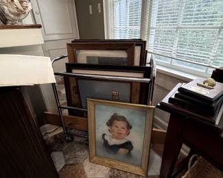 Several large art pieces and some antique frames