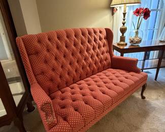 Vintage tufted red settee