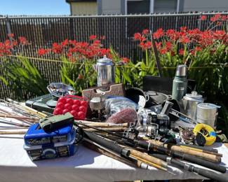 fishing poles, camping and fishing gear