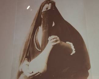 Sepia Toned Photograph of a Veiled Arab Woman with Pearls, possibly by Zangaki or Arnoux