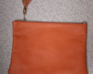 Orange Pebbled Leather Clutch with Tassel by VALENTINA