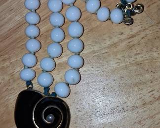 White Glass Bead Necklace with Black Spiral Shell Pendant