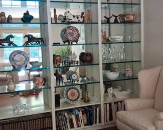 Assortment of Decorative Objects, Books, and Display Shelving