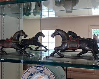 Vintage Cast Iron Horses with Red Saddles