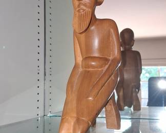 African Wooden Figurine of a Seated Man