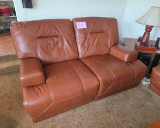 Available now loveseat leather electric recliner $400