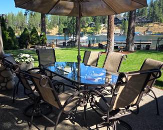 AVAILABLE NOW $500 table six chairs umbrella $500