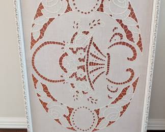 white Richelieu cutwork embroidery in a floral basket design