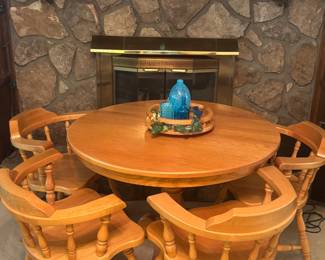 Solid wood round table with four chairs