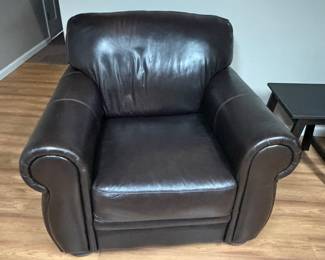 Brown leather chair, has a matching loveseat