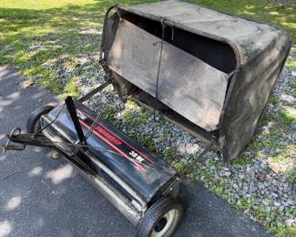 Tow behind sweeper