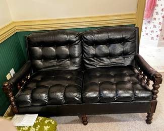 #39	Vintage 56" wide leather loveseat w wood button back and seat	 $75.00 