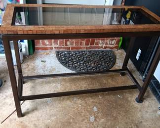 #203 Darker brown metal sofa table 2 glas shelves 42x16x30	 $60.00 			