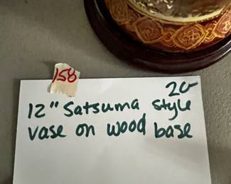 #158	Satsuma style 12" vase on wood base	 $20.00 
