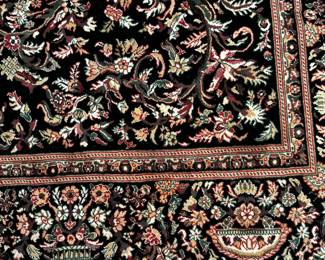 #5	Machine made rug. 129x98" Black w red and green pattern	 $120.00 