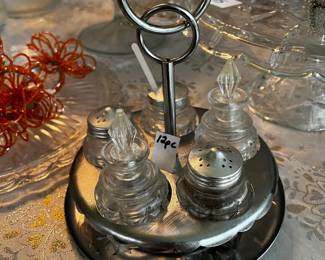 #103	12 Pc salt and pepper carousel. Aluminum	 $20.00 