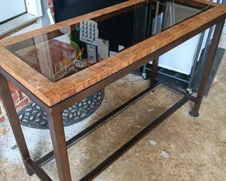 #203		Darker brown metal sofa table 2 glas shelves 42x16x30	 $60.00 			