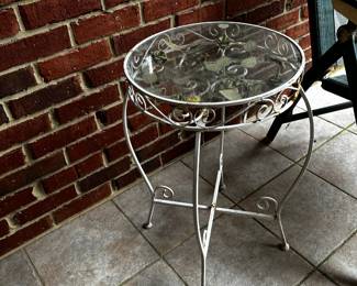 #88	Iron glass top white painted end table w roses 14" round x 24" tall as is rust	 $30.00 