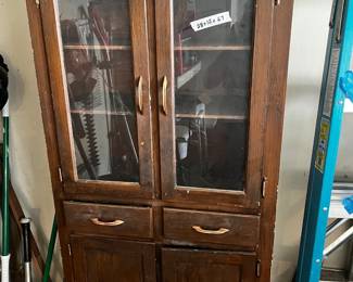 #175	Display cabinet 28x12x67" 4 door 2 drawers 	 $75.00 