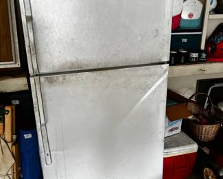 #173	GE garage fridge as is freezer on top	 $75.00 