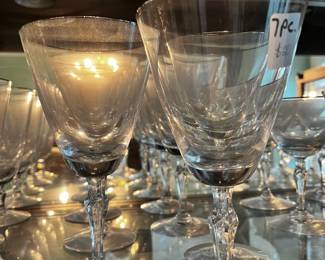 #125	7 pc wine glass w silver trim 7" tall	 $20.00 